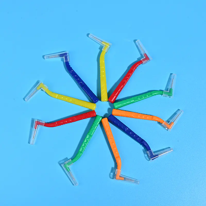 L-type interdental brushes with ergonomic angled handles in assorted colors, designed for professional oral care cleaning between teeth, ideal for B2B dental suppliers and OEM manufacturing.