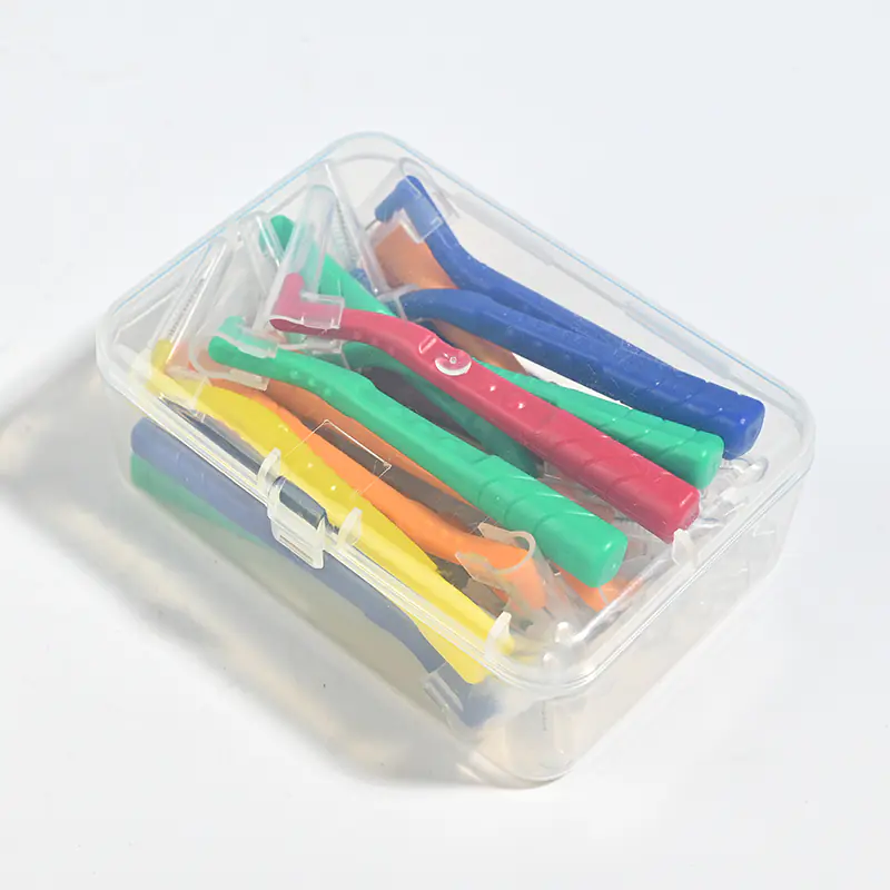 L-type interdental brushes with ergonomic angled handles in assorted colors, designed for professional oral care cleaning between teeth, ideal for B2B dental suppliers and OEM manufacturing.
