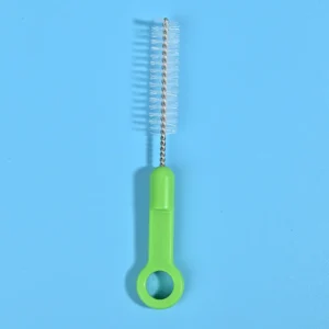 Medical device cleaning brush with stainless steel twisted wire and nylon bristles, featuring an ergonomic green handle for precise cleaning of tubes and medical instruments, suitable for B2B wholesale supply.