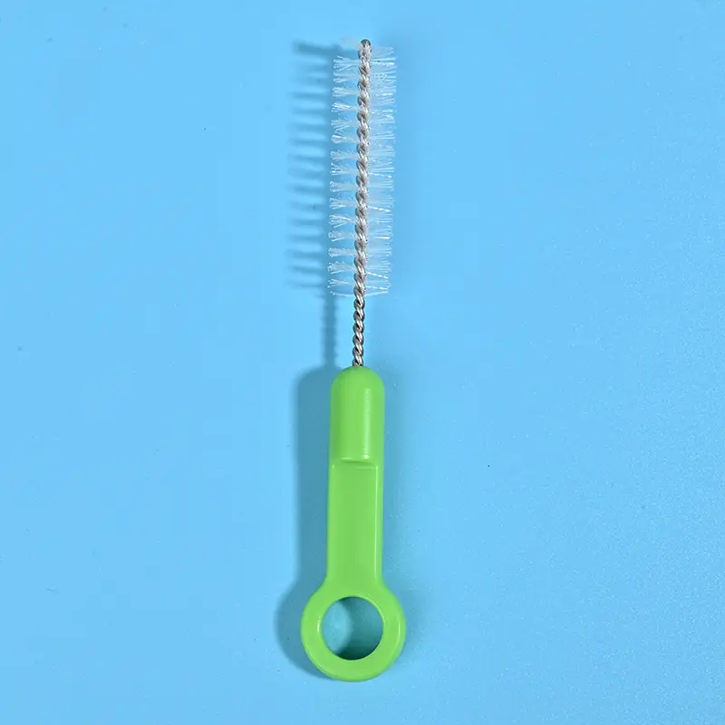 Medical device cleaning brush with stainless steel twisted wire and nylon bristles, featuring an ergonomic green handle for precise cleaning of tubes and medical instruments, suitable for B2B wholesale supply.