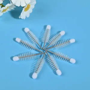 Mascara brush heads with twisted stainless steel wire and soft nylon bristles for cosmetic manufacturing