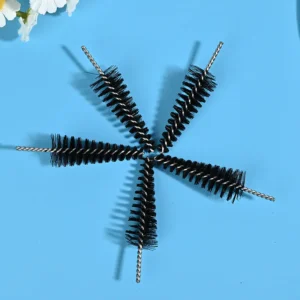 Medical device cleaning brush heads with black nylon bristles and stainless steel twisted wire core, designed for precise cleaning of medical instruments and narrow channels, B2B wholesale supply.