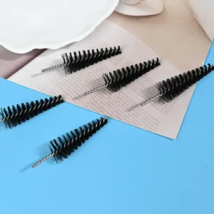 Medical device cleaning brush heads with black nylon bristles and stainless steel twisted wire core, designed for precise cleaning of medical instruments and narrow channels, B2B wholesale supply.