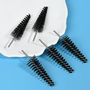 Medical device cleaning brush heads with black nylon bristles and stainless steel twisted wire core, designed for precise cleaning of medical instruments and narrow channels, B2B wholesale supply.