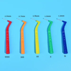 Color-coded L-shaped interdental brushes with ergonomic angled handles and nylon bristles, designed for effective plaque removal, OEM supply, and B2B dental care distribution