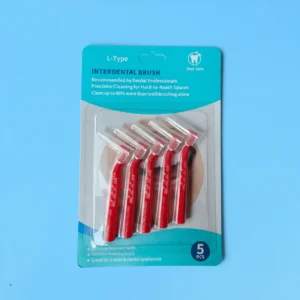 L-shaped interdental brushes in blister packaging with ergonomic angled handles and protective caps, ideal for dental cleaning, OEM supply, and B2B wholesale oral care products