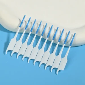 close-up of blue silicone interdental brushes arranged in a row