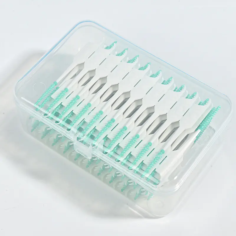 bulk-green-silicone-interdental-brushes-top-view.jpg top view bulk pack green silicone interdental brushes in clear storage box