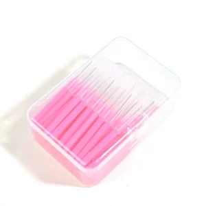 Bulk pink handle interdental brushes with clear protective caps in storage box - ISO standard 0.4mm 0.5mm 0.6mm sizes for professional dental hygiene