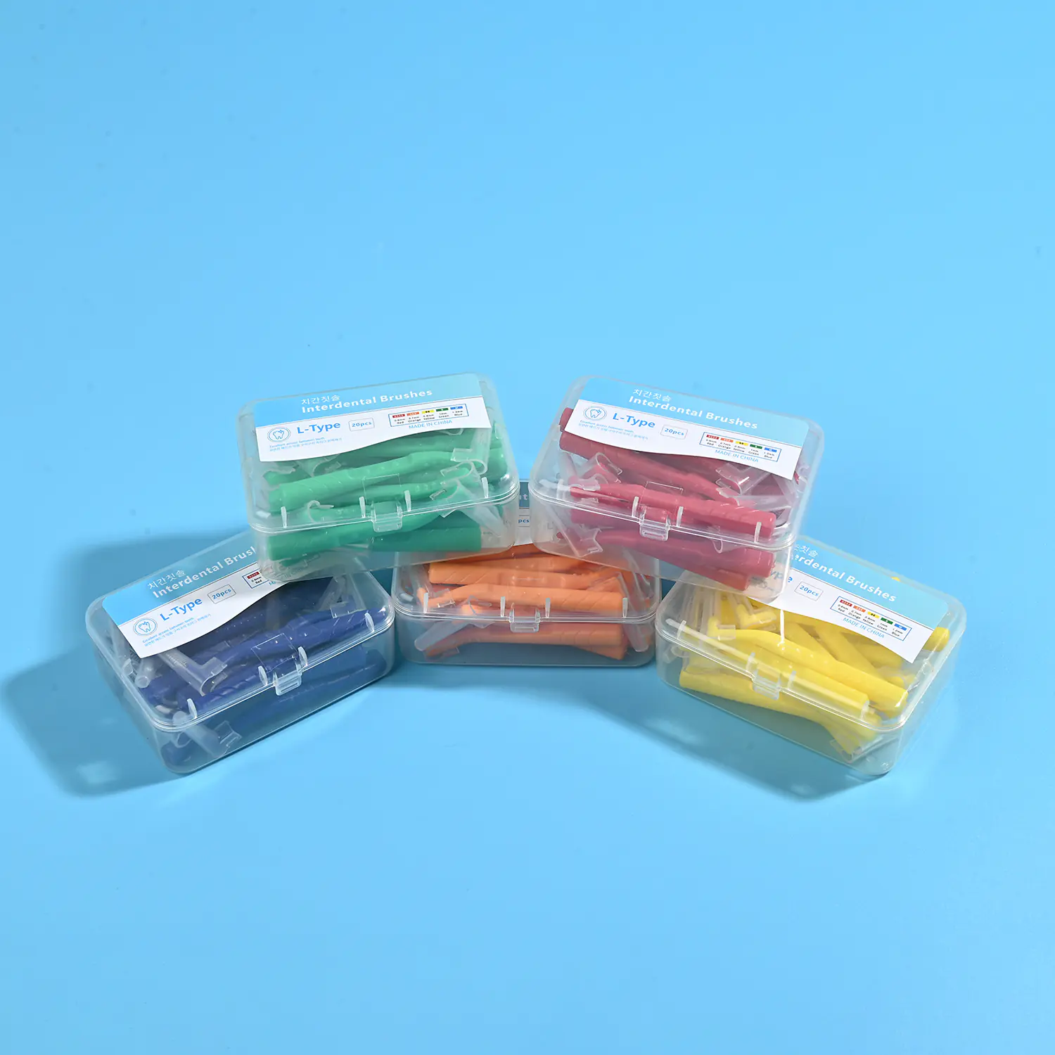 L-type interdental brushes in clear plastic box kits, multiple colors
