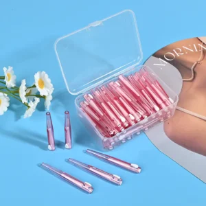 open clear box of retractable pink interdental brushes with sliding mechanism