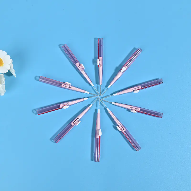 star arranged retractable pink interdental brushes showing extended bristles