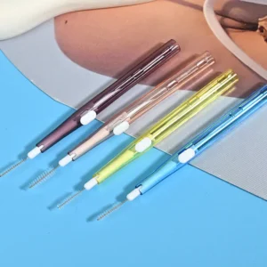 transparent retractable interdental brushes showing dual tip design (brush + toothpick)