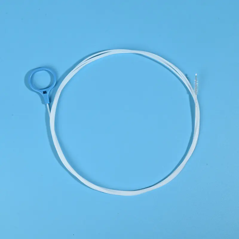 white endoscope cleaning brush with blue loop handle for easy hanging and use