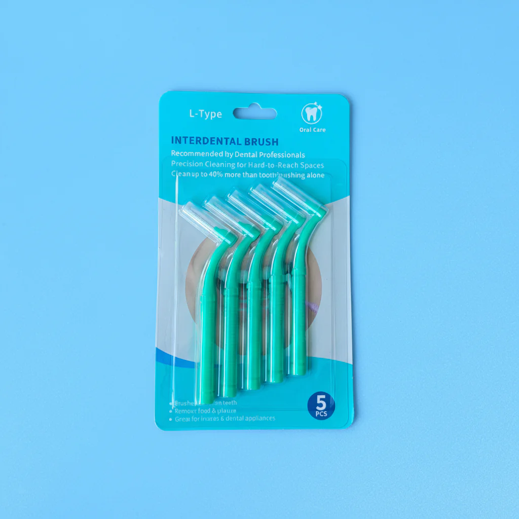 5 pieces green L-type angled interdental brushes in blister card retail packaging on blue background, shelf-ready dental packs factory wholesale