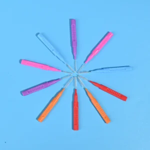 Five-color retractable pull-push I-type interdental brushes arranged radial star shape on solid bright blue background