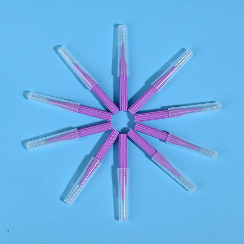 Purple I-type interdental brushes with protective caps arranged in star shape, wholesale dental cleaning tools from Qingdao factory