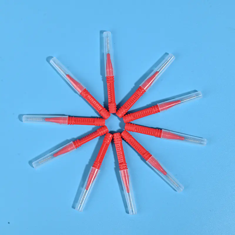 Red I-type interdental brushes with protective caps arranged in star shape, wholesale dental cleaning tools from Qingdao factory