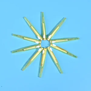 Transparent yellow sliding push retractable I-type interdental brushes arranged radial star shape on solid light blue background