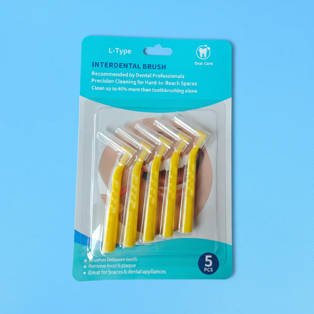 5pcs yellow fixed L-curved interdental brushes packed in printed English paper blister retail hang card on solid light blue background