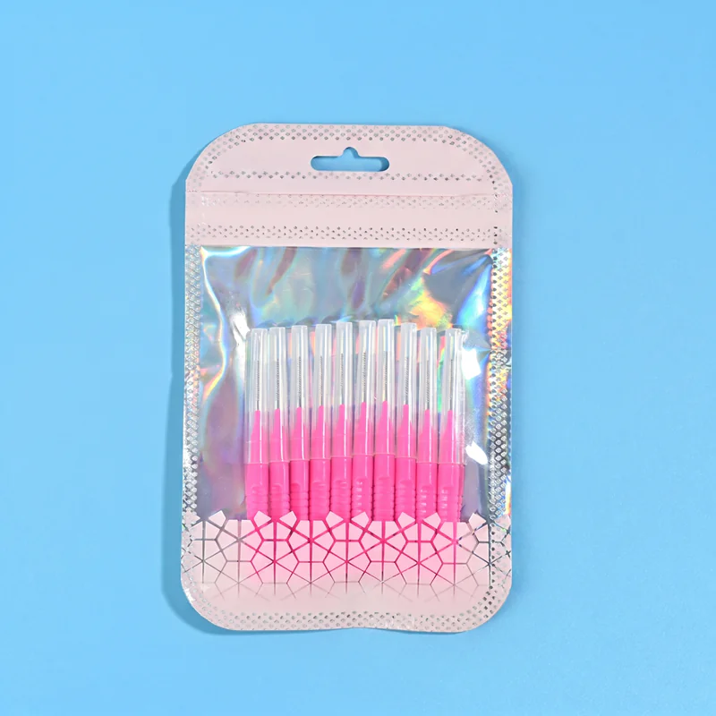 2-pink-retractable-i-type-interdental-brushes-holographic-ziplock-bag-blue-background.jpg Pink retractable I-type interdental brushes packed inside holographic plastic retail pouch on solid bright blue background