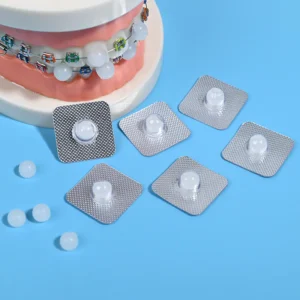 Individual blister orthodontic wax next to orthodontic bracket dental model, real usage demonstration dental supplies wholesale
