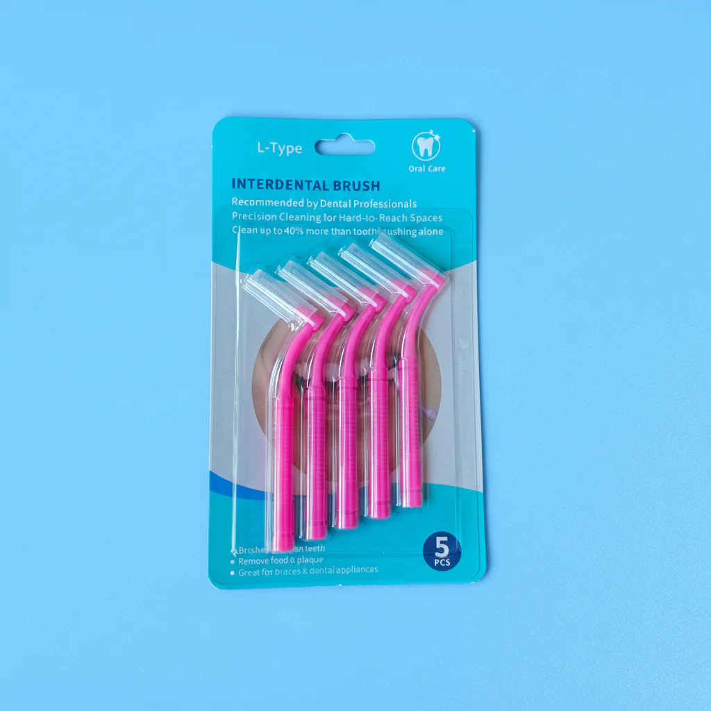 5 pieces pink L-type angled interdental brushes in blister card retail packaging on blue background, shelf-ready dental packs factory wholesale from Qingdao factory