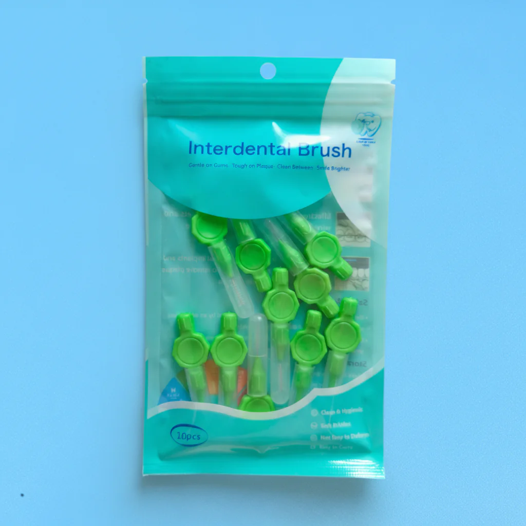 10pcs ziplock plastic bag packed green octagonal knob handle interdental brushes with transparent protective tube, portable teeth gap cleaners