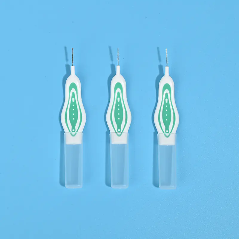 Three green printed ergonomic curved handle interdental brushes with transparent protective tube, single size portable orthodontic teeth gap cleaners